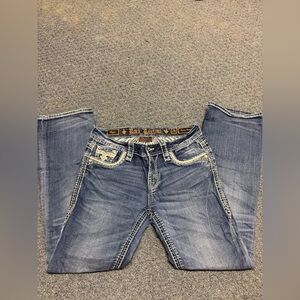 Rock Revival Distressed Denim with White Stitching